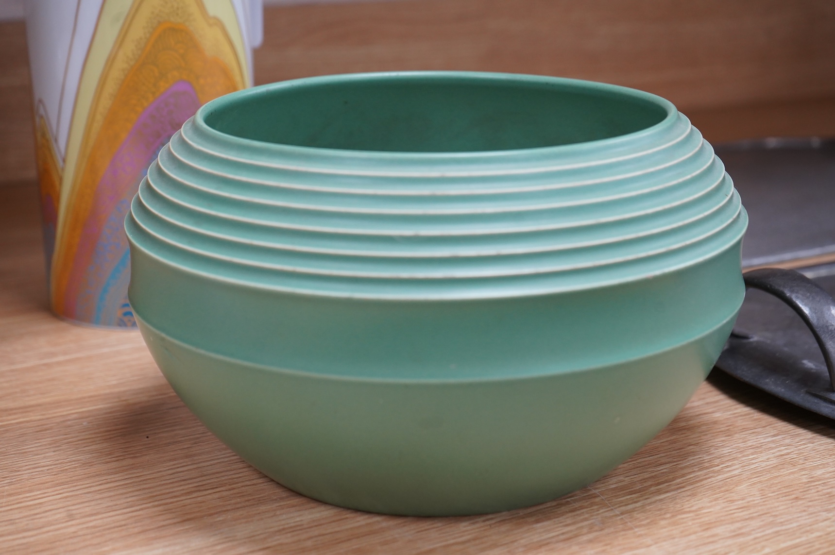 Keith Murray for Wedgwood green glazed ribbed bowl, signed and stamped to the base, 25cm in diameter